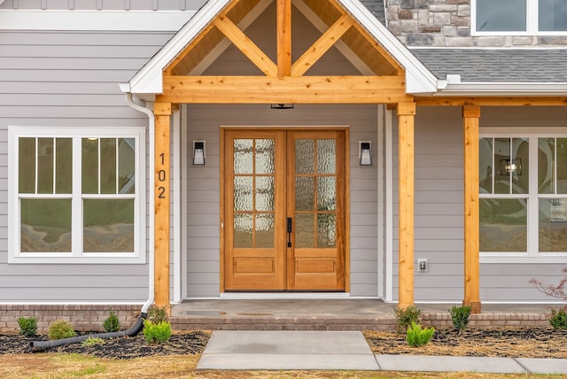 doorway to property featuring french doors