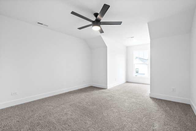 bonus room featuring vaulted ceiling, carpet flooring, and ceiling fan