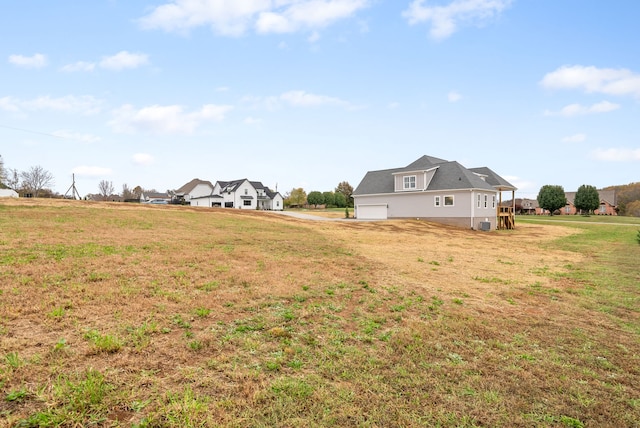 view of yard featuring a garage