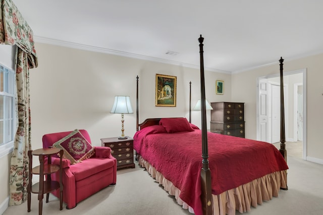 carpeted bedroom featuring crown molding