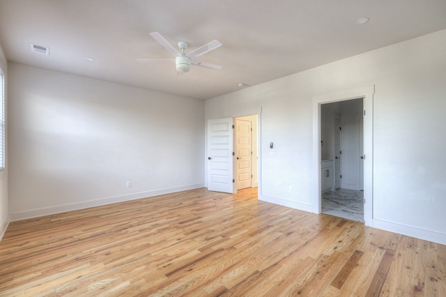 unfurnished bedroom with ceiling fan and light wood-type flooring