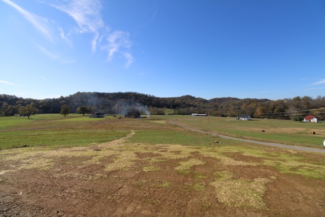 view of mountain feature with a rural view