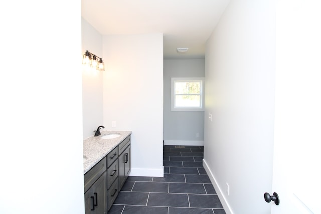 bathroom featuring vanity and tile patterned flooring