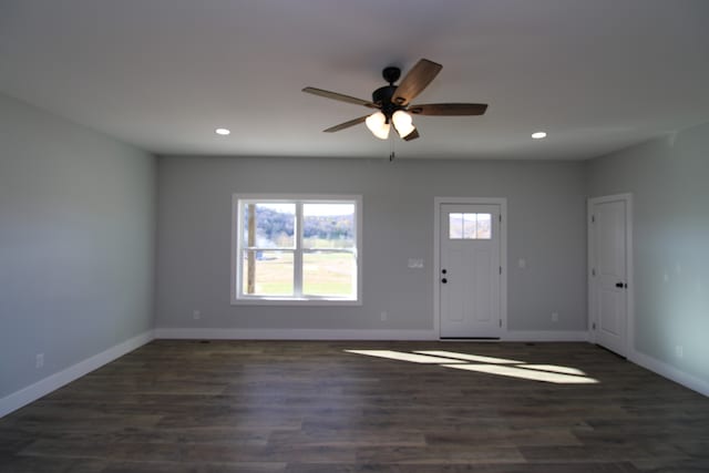 foyer featuring dark hardwood / wood-style floors and ceiling fan