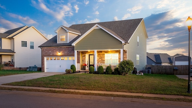 view of front of home with a porch and a lawn