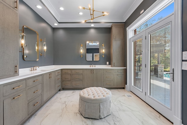 bathroom featuring vanity and crown molding