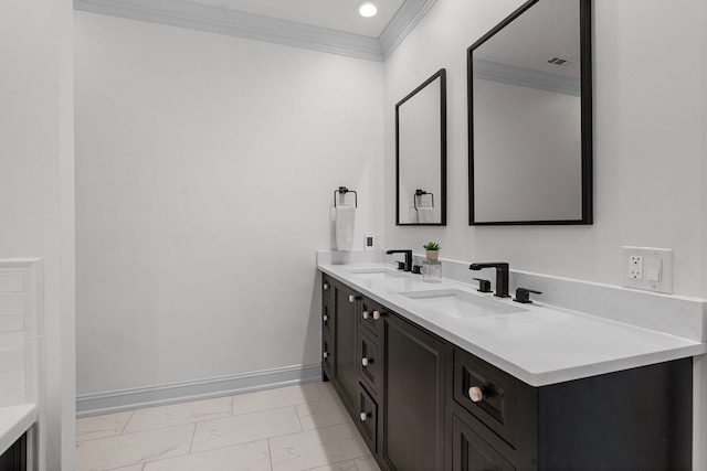 bathroom with vanity and ornamental molding