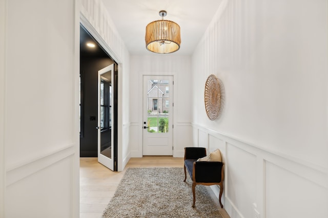 doorway featuring light hardwood / wood-style floors