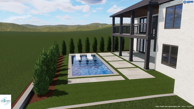 view of pool with a patio area and a mountain view