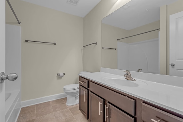 full bathroom featuring toilet, vanity, tile patterned floors, and shower / washtub combination