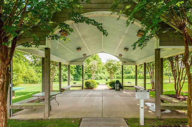 view of home's community featuring a lawn