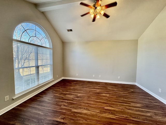 spare room featuring ceiling fan, dark hardwood / wood-style flooring, and lofted ceiling with beams