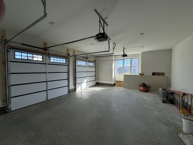 garage featuring a garage door opener