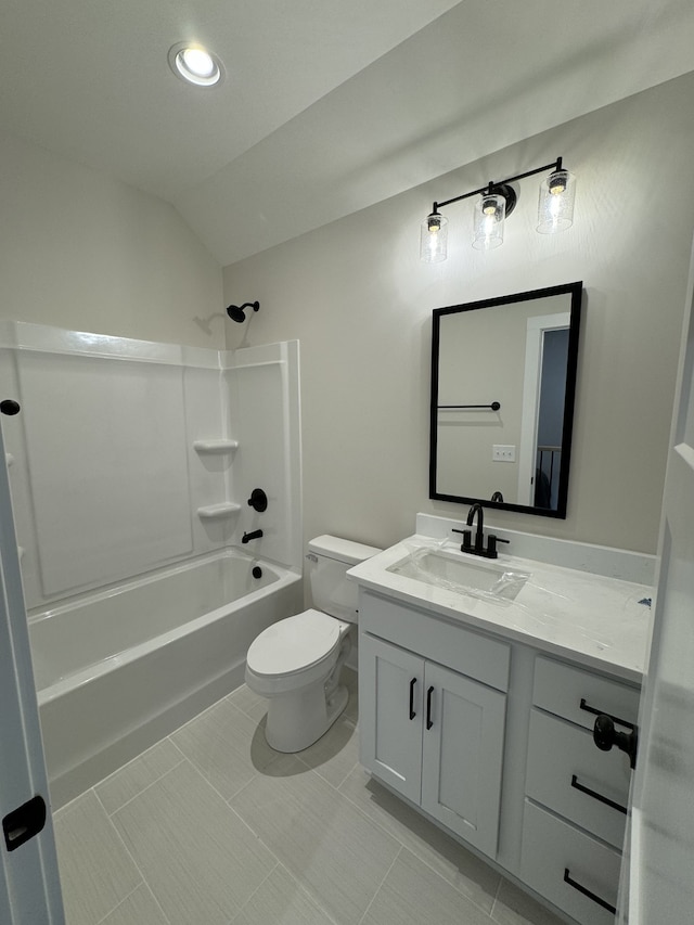 full bathroom featuring tile patterned floors, vanity, shower / bathing tub combination, and lofted ceiling