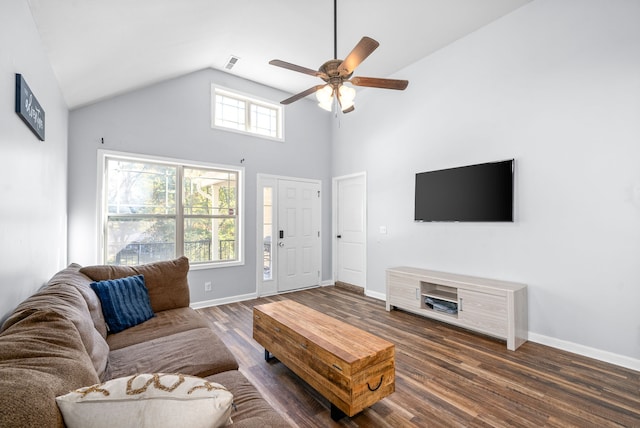 living room featuring ceiling fan, high vaulted ceiling, and dark wood-type flooring