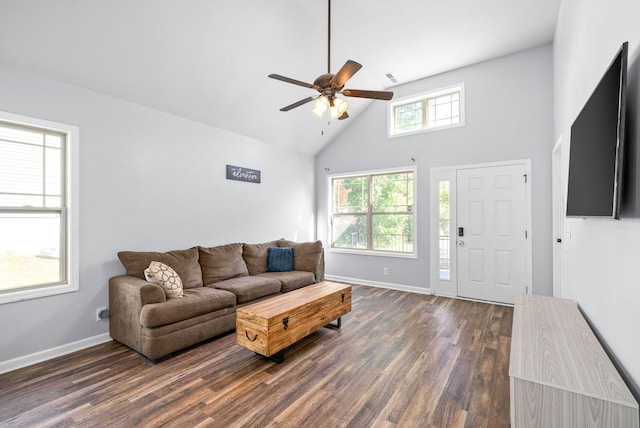 living room featuring high vaulted ceiling, ceiling fan, and dark wood-type flooring