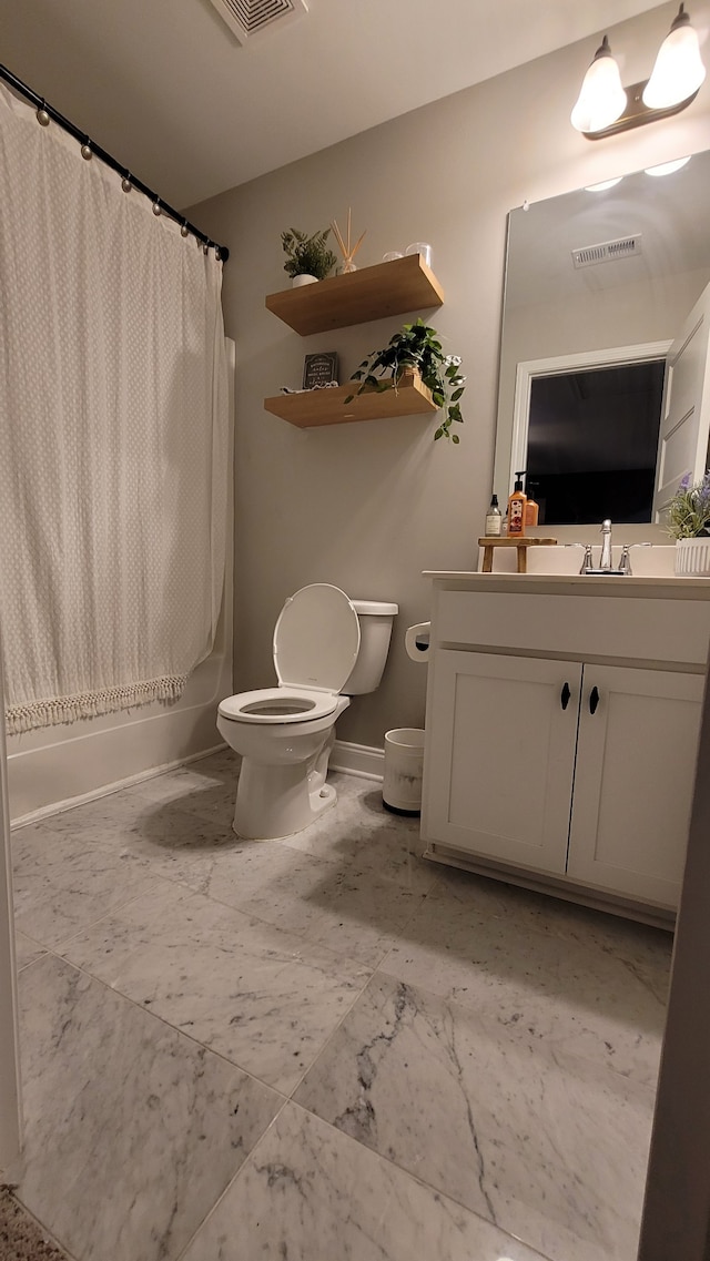 full bathroom featuring vanity, shower / bathtub combination with curtain, and toilet