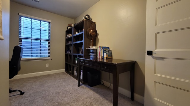 home office featuring light colored carpet