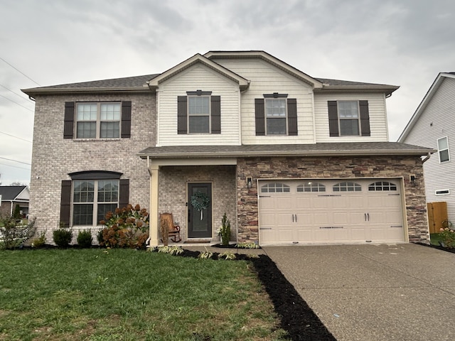 view of front facade featuring a front lawn and a garage