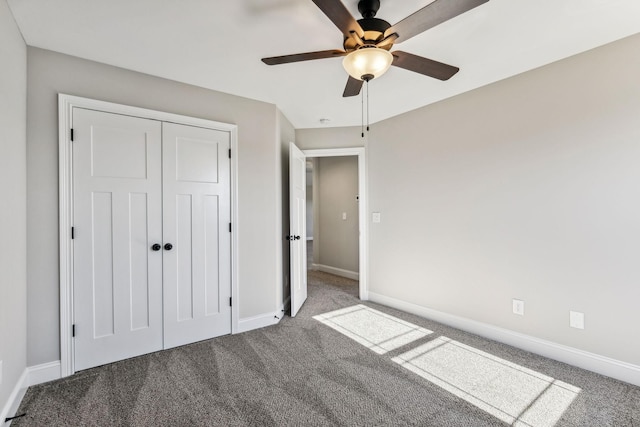 unfurnished bedroom with carpet floors, a closet, and ceiling fan