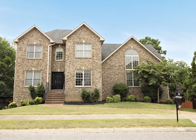 view of front of house with a front yard