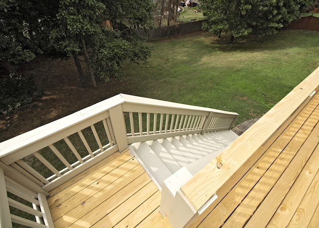 deck featuring a yard