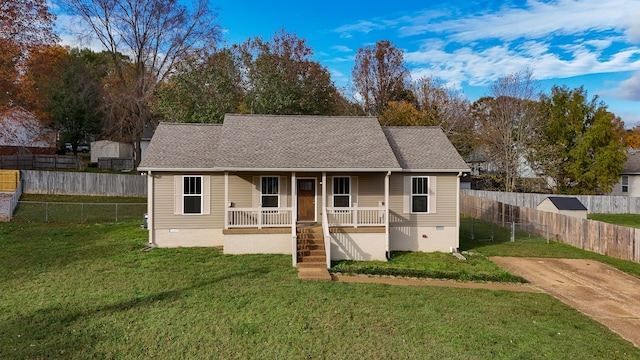 exterior space with a porch and a front lawn