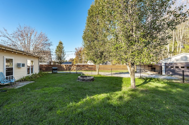 view of yard featuring a fire pit