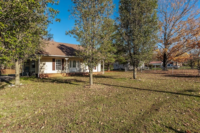 exterior space featuring a front lawn