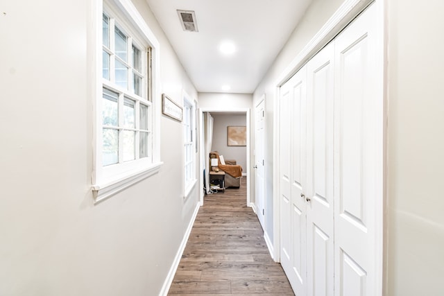 hallway featuring light wood-type flooring