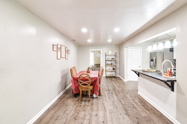 dining room featuring hardwood / wood-style flooring