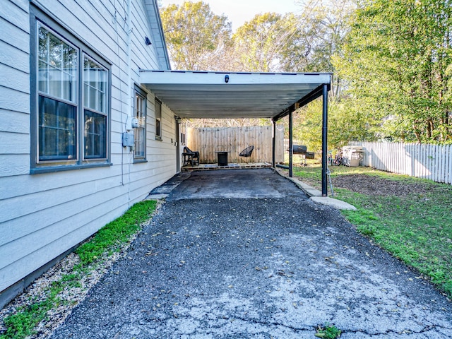 view of car parking with a carport