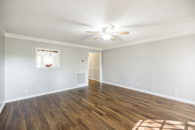 empty room with dark hardwood / wood-style flooring, a textured ceiling, and ornamental molding