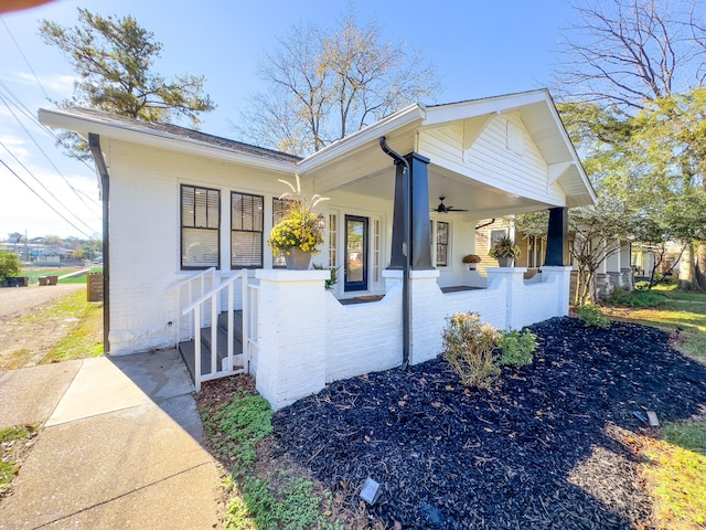 view of front of home featuring covered porch and ceiling fan