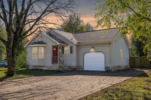 single story home featuring a garage