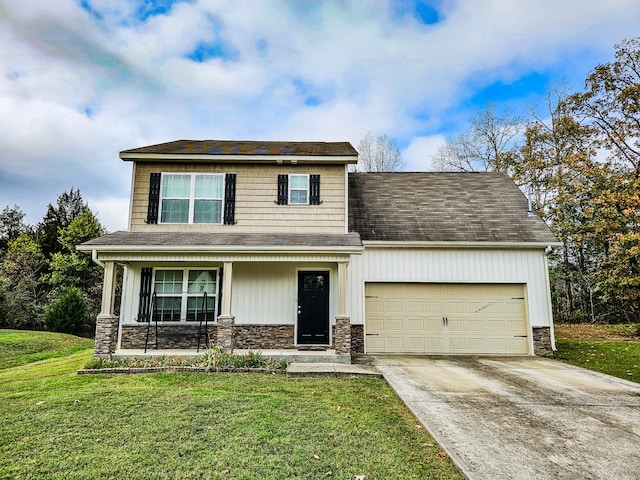 view of front of house featuring a front lawn and a garage