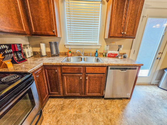 kitchen with stainless steel dishwasher, sink, and black electric range