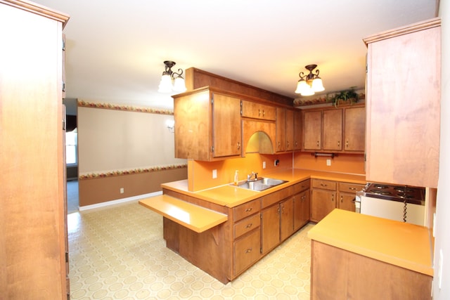 kitchen with sink and white stove