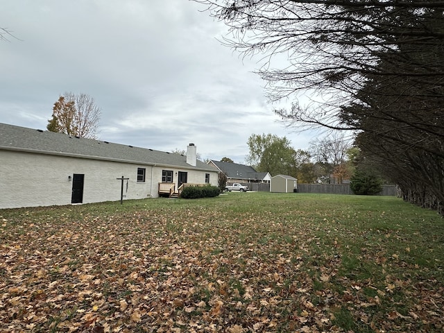 view of yard with a storage shed