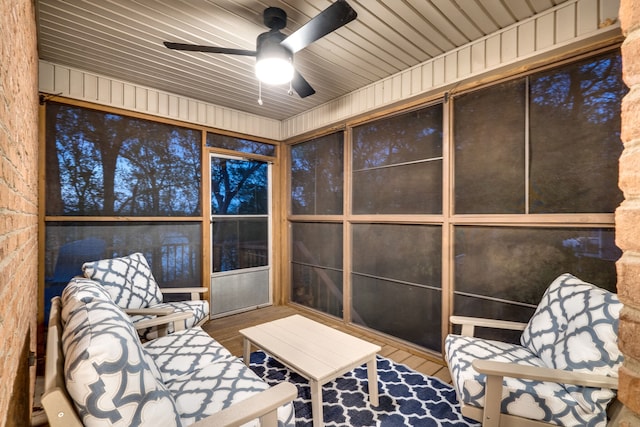 sunroom / solarium with ceiling fan