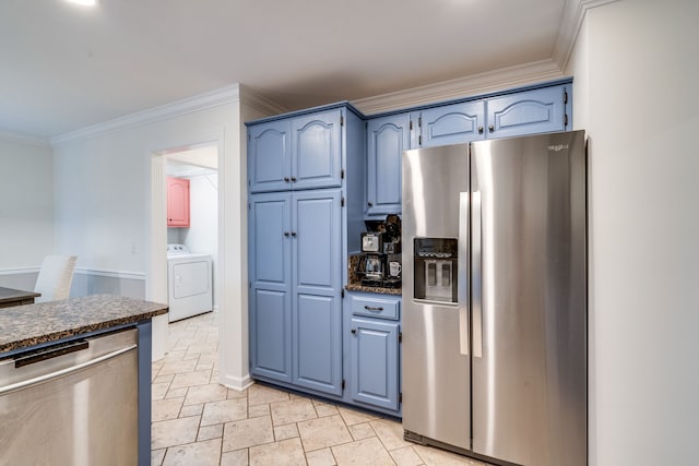 kitchen with ornamental molding, washer / clothes dryer, appliances with stainless steel finishes, and blue cabinets