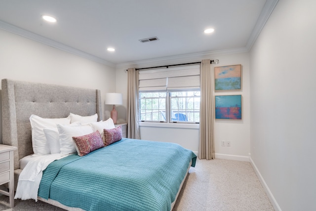 carpeted bedroom featuring crown molding