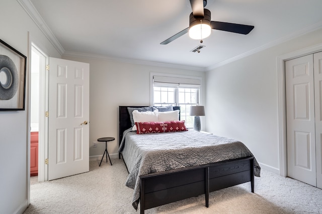 bedroom featuring light colored carpet, ceiling fan, and crown molding