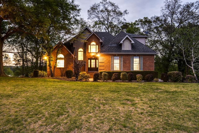 view of front property with a yard