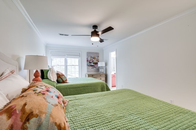 bedroom featuring ceiling fan and crown molding