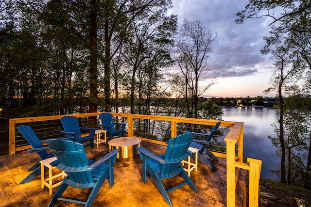 deck at dusk with a water view