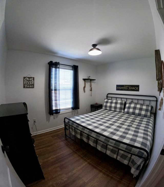 bedroom featuring dark hardwood / wood-style floors