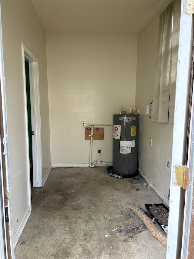 utility room featuring electric water heater