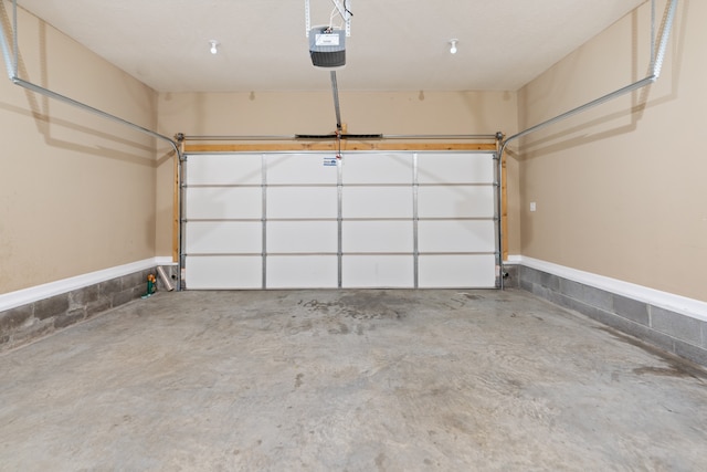 garage featuring a garage door opener