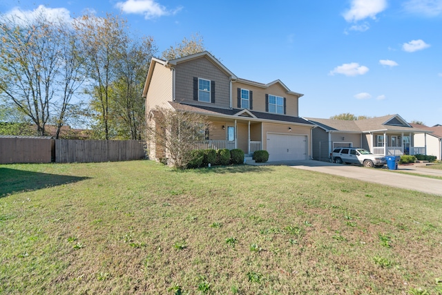 front facade with covered porch, a garage, and a front yard